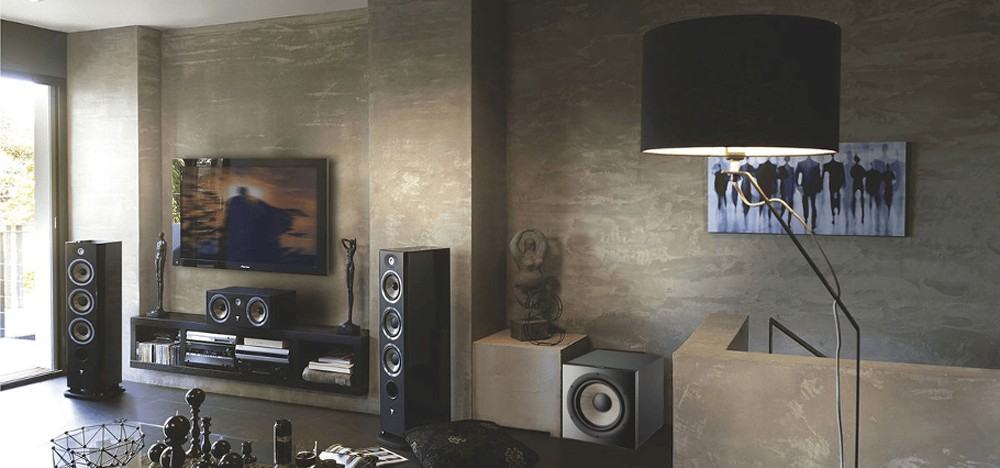 Stylish home theater setup with large flat-screen TV and dual tower speakers