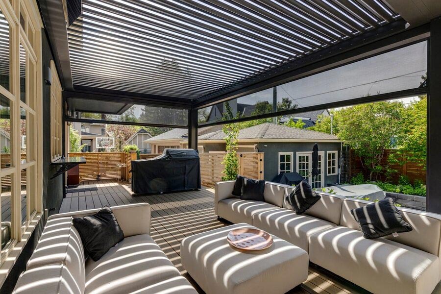 An outdoor patio featuring outdoor shades from Progressive Screens