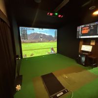A Unekoor golf simulator installed in a luxury residence by IDS Automations.