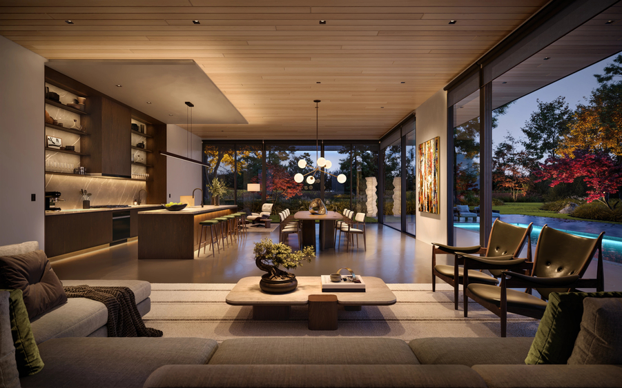 Lutron D2 downlights in an open-concept kitchen and dining area. A modern chandelier hangs above the table.